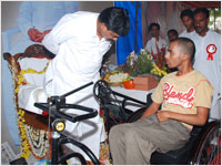 Guruji Speaking to a Person Donated with Tricycle